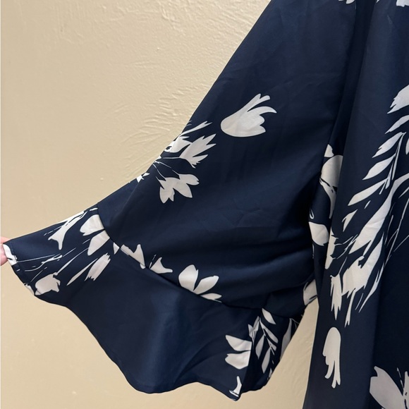 BloomChic NWOT navy floral top with 3/4 length sleeves with a ruffled cuff. 26 - Picture 3 of 8
